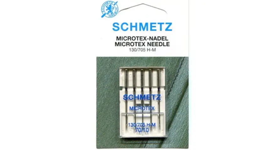 Aiguille microtex Schmetz pour tissus fins et synthétiques. Idéale pour un travail précis.